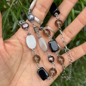 Stunning handmade necklace with genuine gemstones, shell, pearls, and art glass